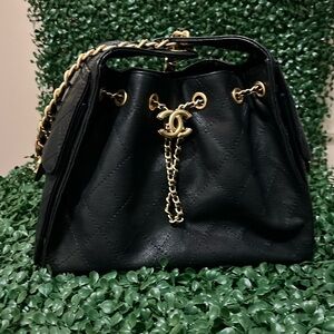 Black and gold accent bag